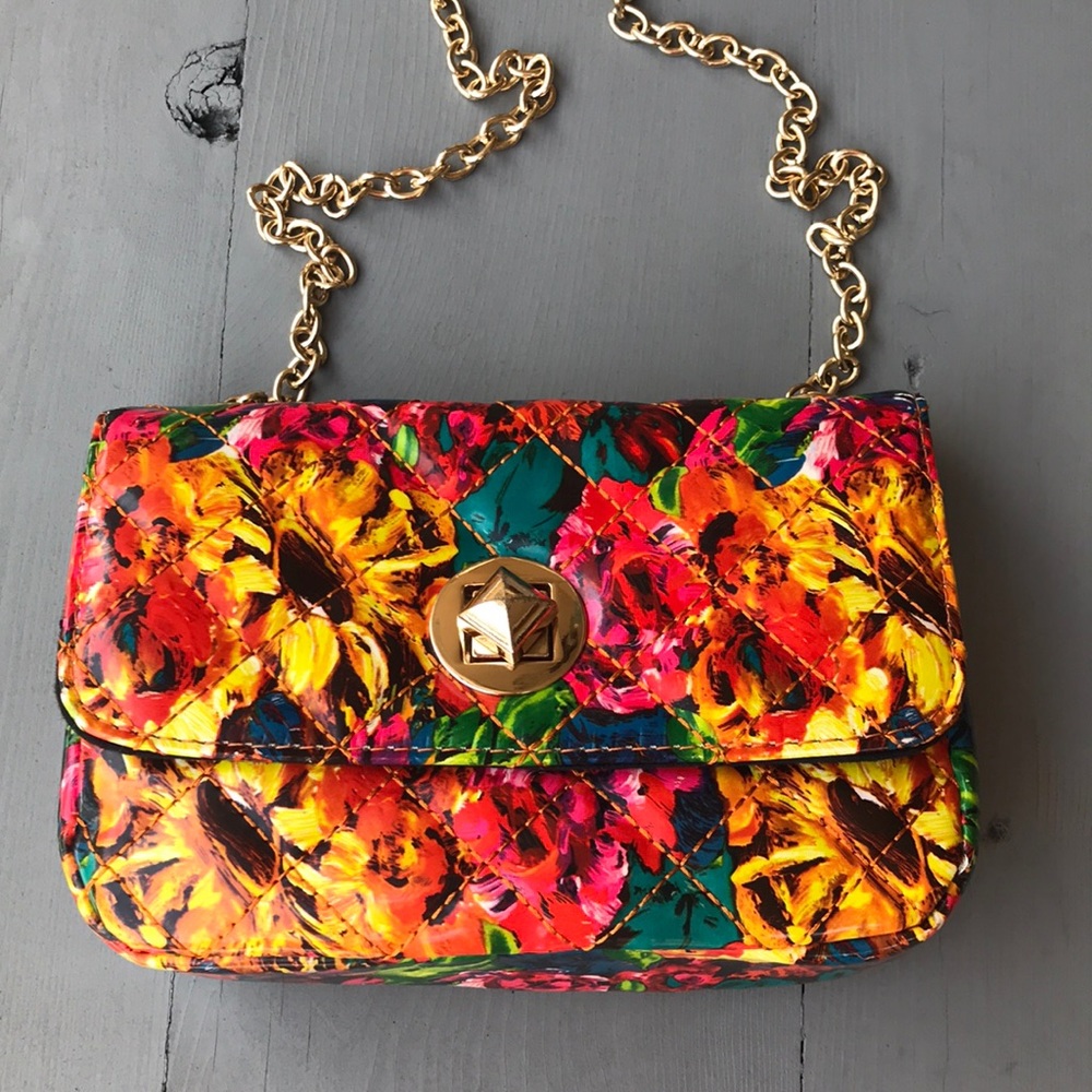 Small, floral, cross body purse.